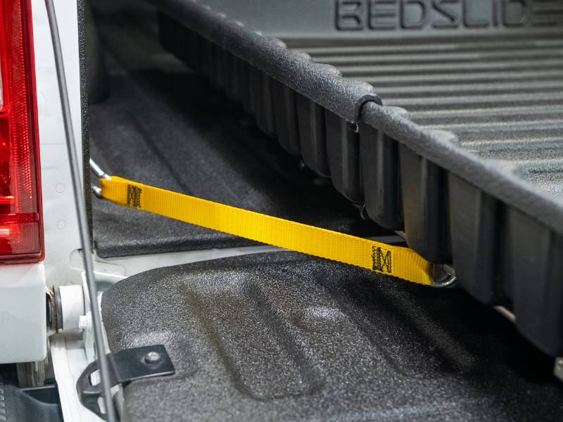 BEDSLIDE 500Go tether strap clipped to the tailgate tie-down point