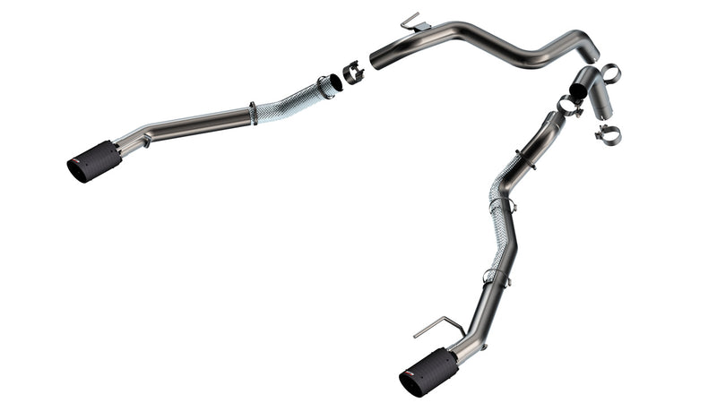 Borla Tail Pipe Kit, complete kit on a studio background: A stainless dual tail pipe kit with clamps and two dark carbon fiber tips is laid out on white
