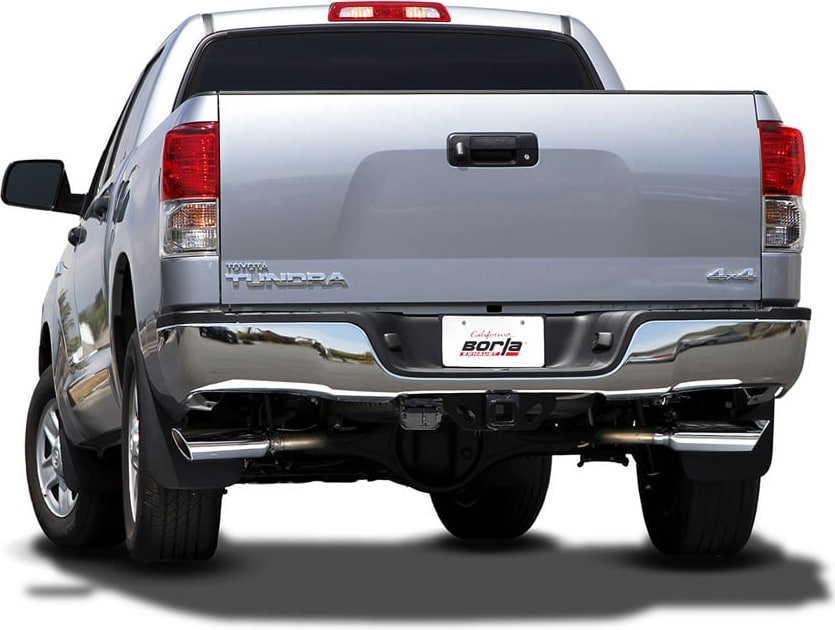 Cat-Back Exhaust Systems by Borla: Silver Toyota Tundra rear view with polished exhaust tips at both corners under the rear bumper and a Borla plate.