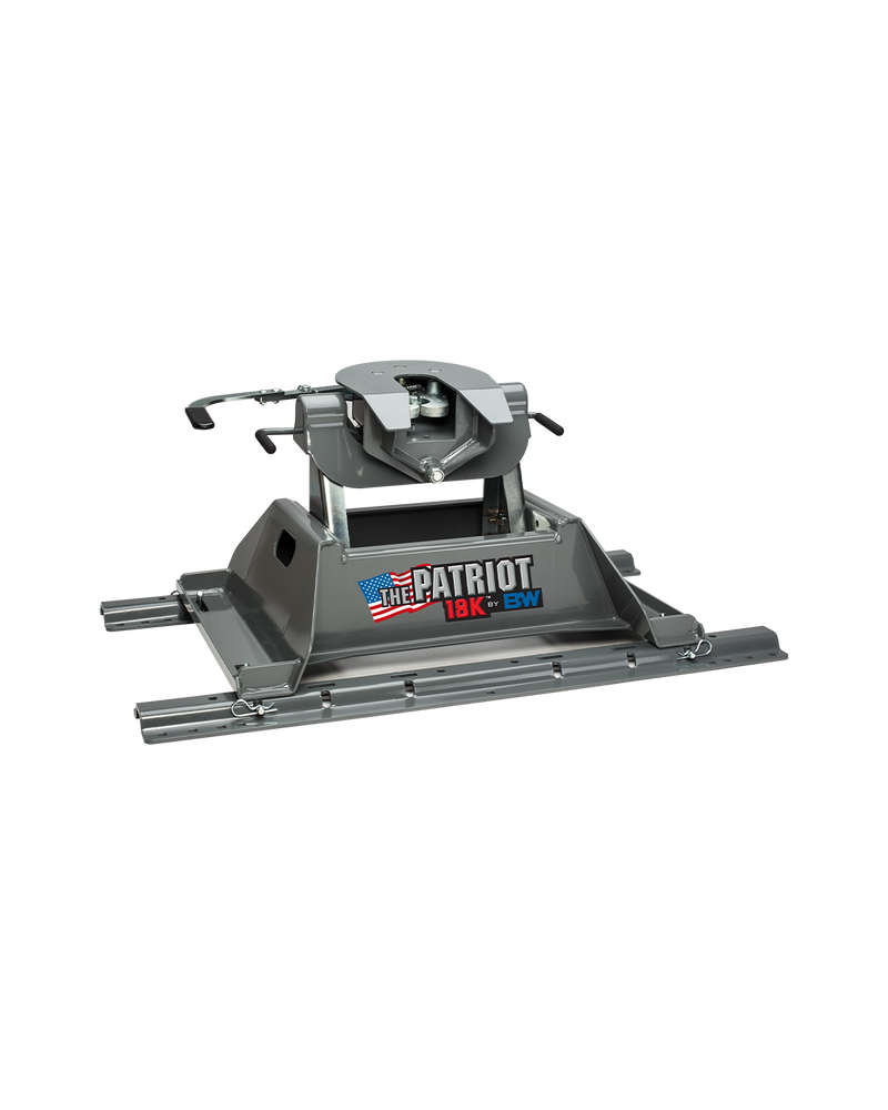 B&W RVK3255 complete fifth wheel hitch. This listing supplies only the coupler head in this photo, the upper unit with the jaws and the release handles; the base it is sitting on is not included