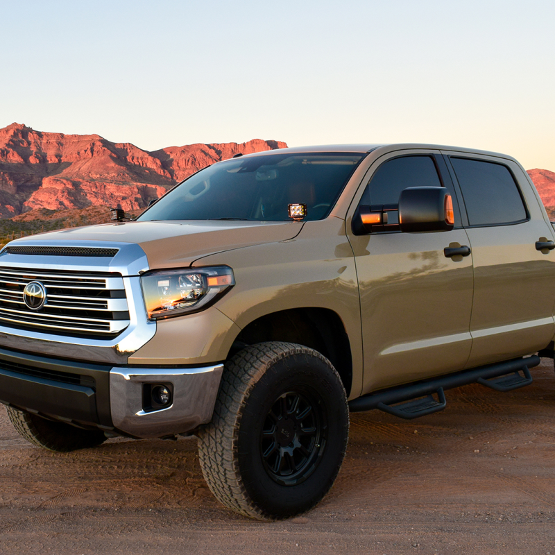Rigid D-SS Flood A-Pillar Light Kit installed on a tan Toyota Tundra in the desert