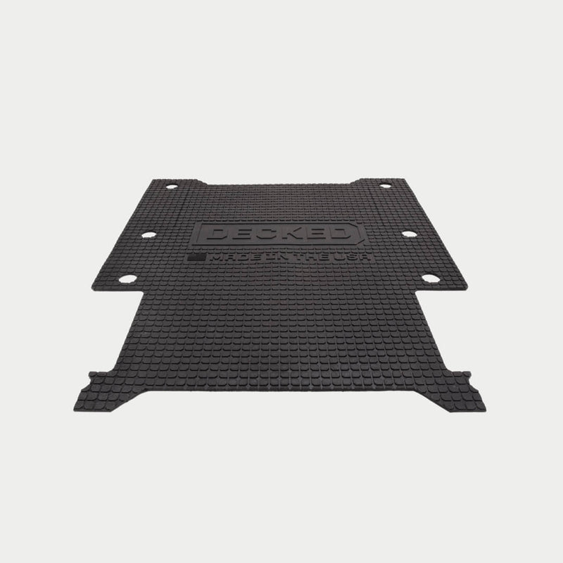 Black DECKED Battle Mat for full-size drawer systems shown flat in studio, with square-nub rubber tread and the DECKED logo molded into the surface