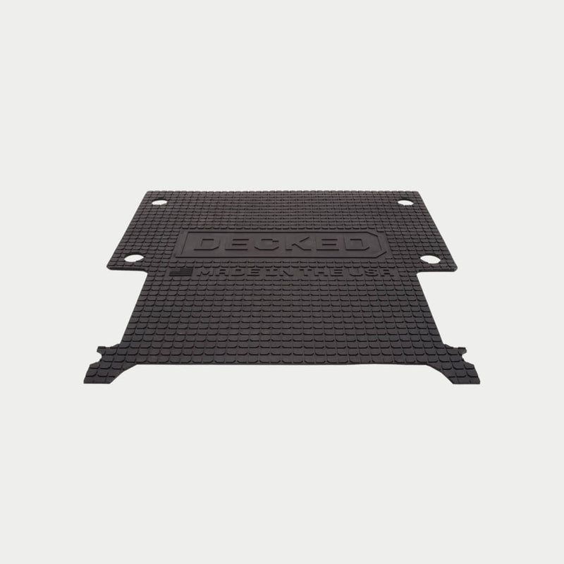 Black DECKED Battle Mat for midsize drawer systems shown flat in studio, with square-nub rubber tread and the DECKED logo molded into the surface