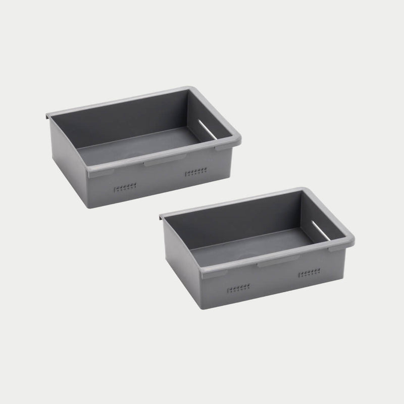 Pair of shallow gray DECKED Stash Bins shown in studio, low open-top bins with molded lip flanges