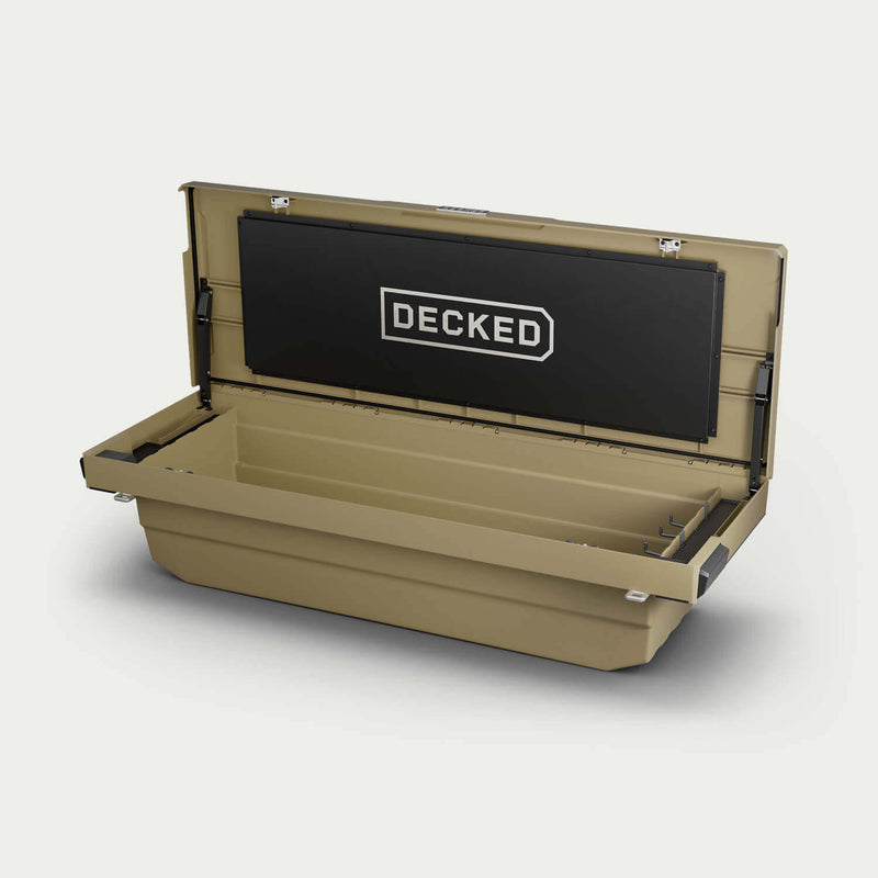 Fender Dirt tan DECKED Tool Box DTB2T22-TAN open in a studio view, showing the full-width tub, gas strut lid assist and the DECKED logo panel inside the lid