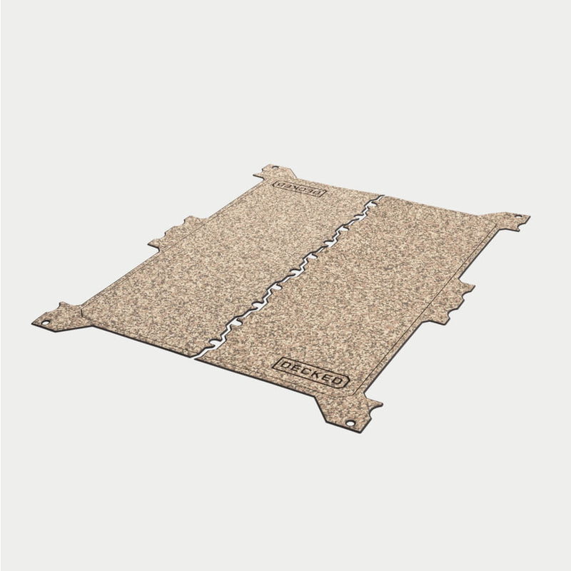 Angled studio view of the tan camo DECKED Traction Mat for full-size drawer systems showing the notched edge tabs