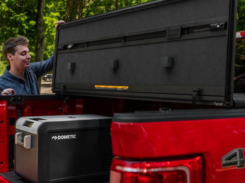 Extang Solid Fold ALX Hard Folding Tonneau Cover for 2022-2026 Nissan Frontier (5' Bed), in use