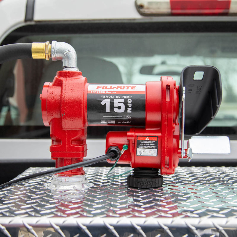 Fill-Rite TankDefender pump support, being fitted under a 12V pump on a transfer tank