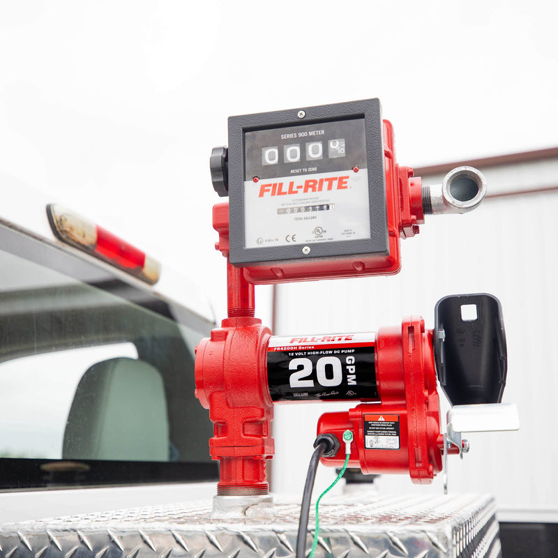 Fill-Rite FR4211HN 20 GPM, 12V DC Pump, 5' Ground Wire, 18'12 Gauge 2 Wire Battery Cable & 901c Gallon, mounted on a diamond-plate transfer tank in a pickup bed