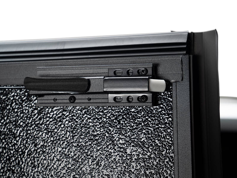 Gator EFX hard folding tonneau cover: Close-up of the cover clamp and bolt on the inner bed rail