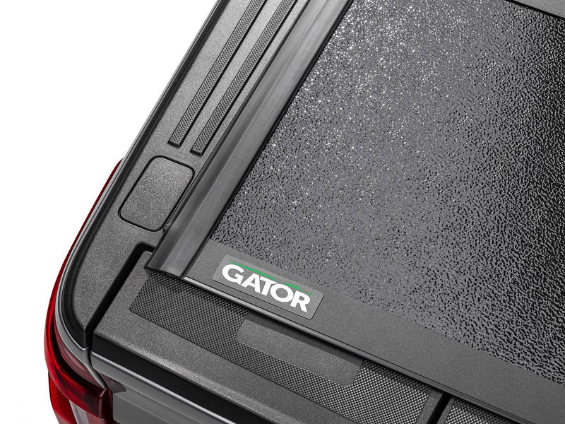 Gator EFX hard folding tonneau cover: Close-up of the hard panel corner with the Gator badge