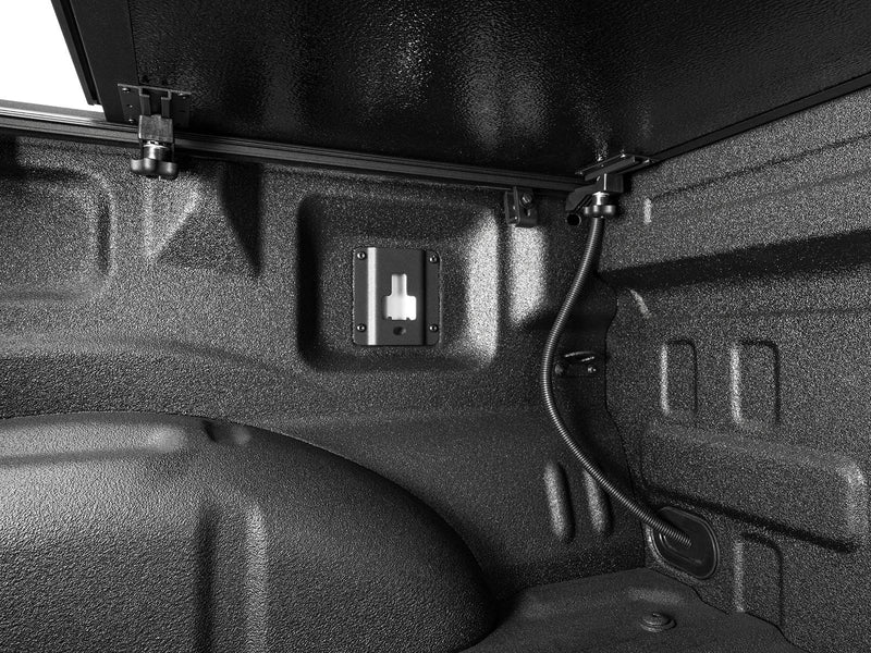 Gator EFX hard folding tonneau cover: Underside of the raised hard cover with the release cable along the bed wall