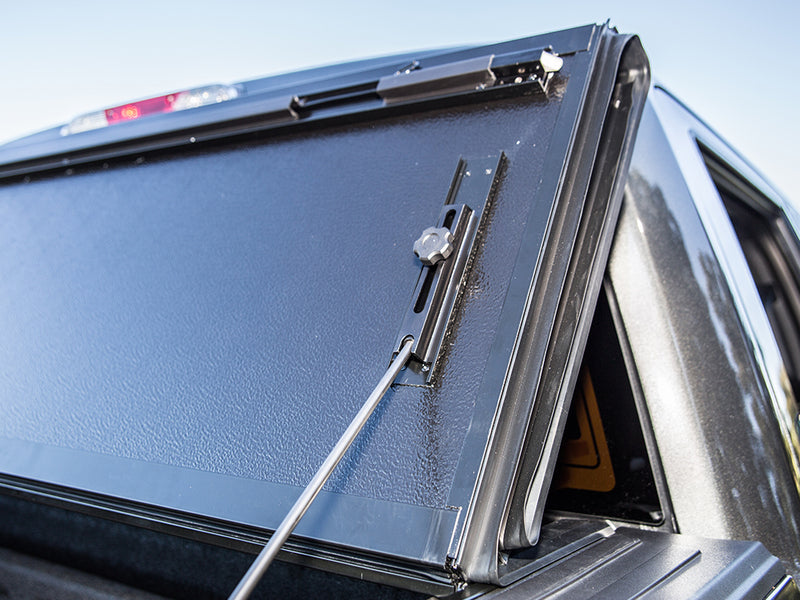 Gator FX hard folding tonneau cover: prop rod holding the folded panels upright, close-up
