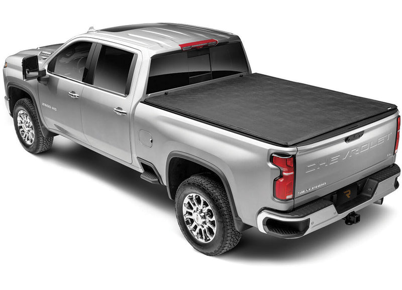 Gator SFX soft tri-fold tonneau cover: closed on a silver Chevrolet heavy-duty pickup