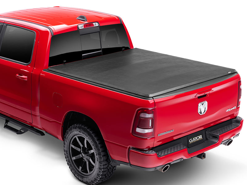Gator SFX soft tri-fold tonneau cover: closed on a red Ram pickup