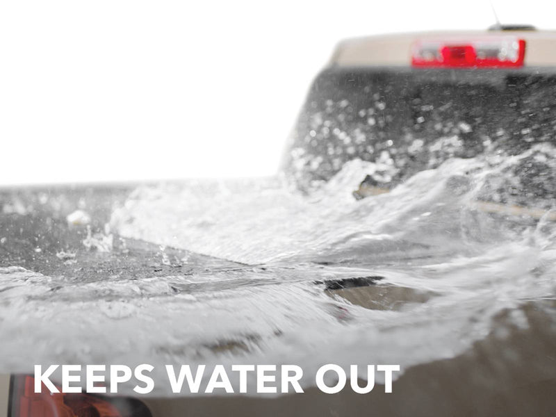 Water splashing across a closed Gator EFX cover, captioned Keeps water out