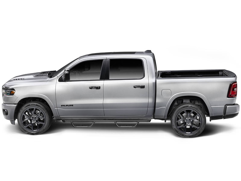 Go Rhino Dominator Xtreme D2: silver crew cab pickup in side profile with black tube side steps and a drop step at each door