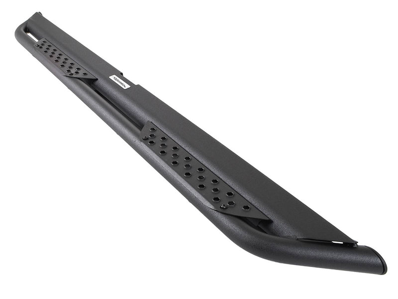 Go Rhino Dominator Xtreme DT: single textured black side step with perforated step pads, angled studio view