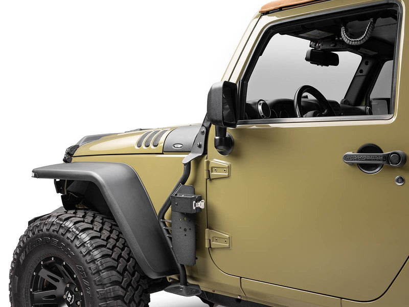 Go Rhino Exterior Jack Mount: empty black jack mount beside the front door of an olive Jeep Wrangler