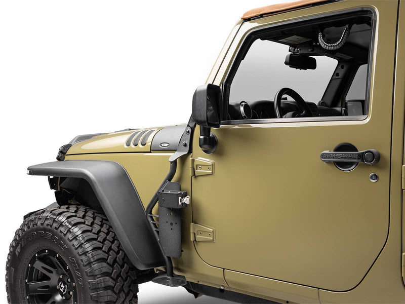 Go Rhino Exterior Jack Mount: empty black jack mount bolted beside the front door of an olive Jeep Wrangler