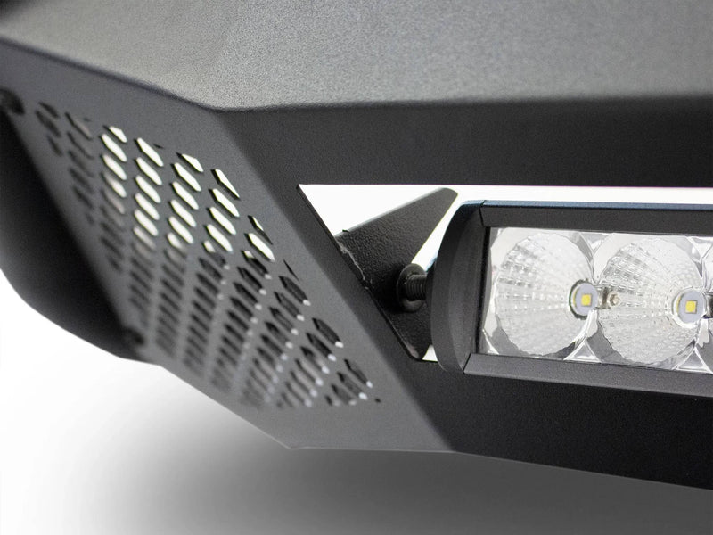 Go Rhino RC4 LR: close-up of a textured black bull bar skid plate with hex mesh and the end of an LED light bar (shown with LED light bar, not included)