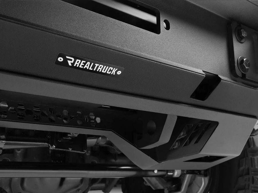 Go Rhino Trailline Stubby Front Bumper: Close-up of a stubby front bumper face with RealTruck plate and winch opening