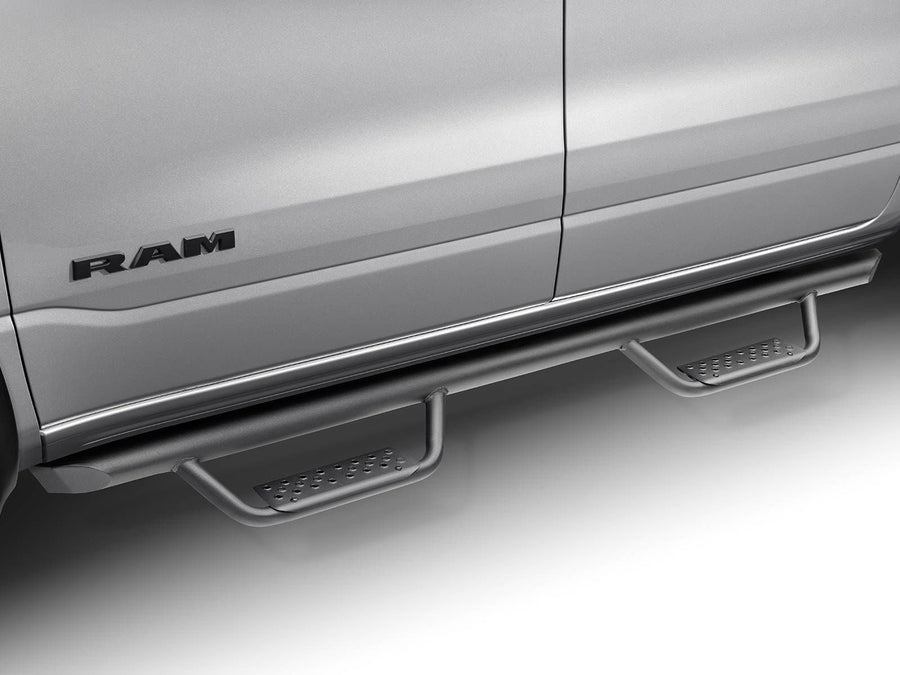 Go Rhino Dominator Xtreme D2 Side Steps: Black tube side step with two drop steps mounted under the doors of a silver Ram