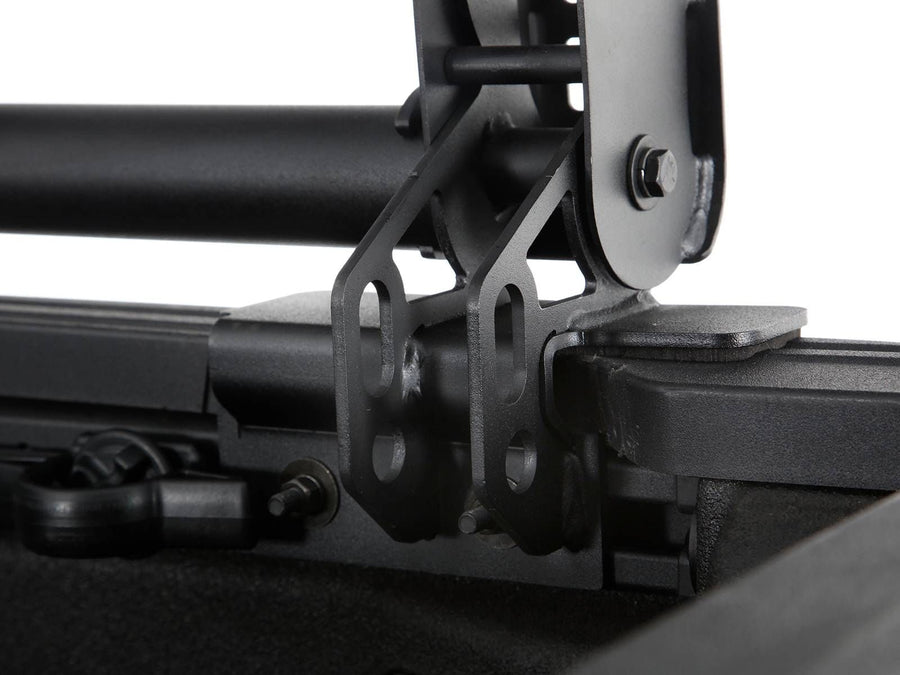 Go Rhino XRS Overland Xtreme Bed Rack: Close-up of a bed rack clamp mount on a bed rail