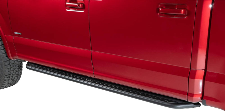 Go Rhino Dominator DSS Sliders: Black slider board mounted under the doors of a red crew cab pickup, cab length