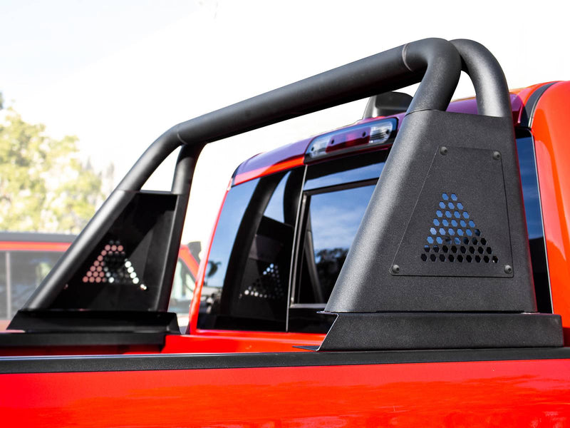 Go Rhino Sport Bar 3.0: black sport bar with hex vent side posts on a red pickup bed