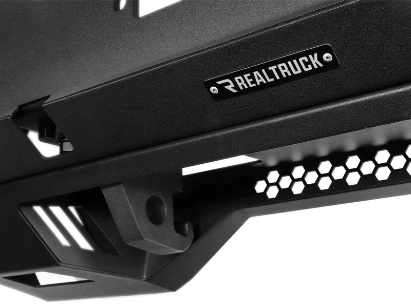 Go Rhino Trailline: close-up of a stubby front bumper with RealTruck plate and honeycomb skid plate cutouts