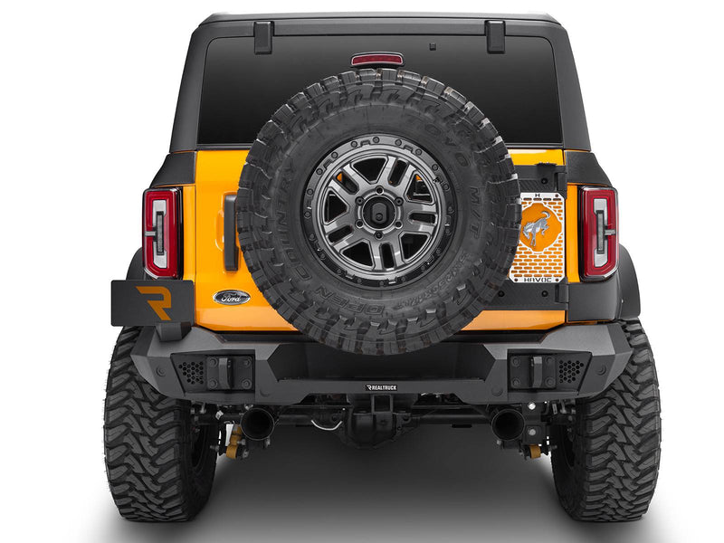 Go Rhino Trailline: rear view of an orange Ford Bronco with a full-width rear bumper and hitch receiver (shown with spare tire, aftermarket wheels, third-party license plate holder, not included)