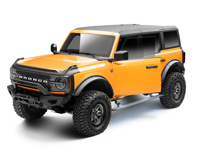Go Rhino VoltStep: yellow Ford Bronco 4-door with a black power running board deployed and blue courtesy lighting (shown with aftermarket bumper, aftermarket wheels and tires, not included)