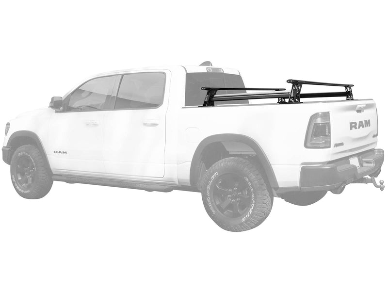 Go Rhino XRS: black cross bars on the bed rails of a ghosted white Ram 1500 crew cab