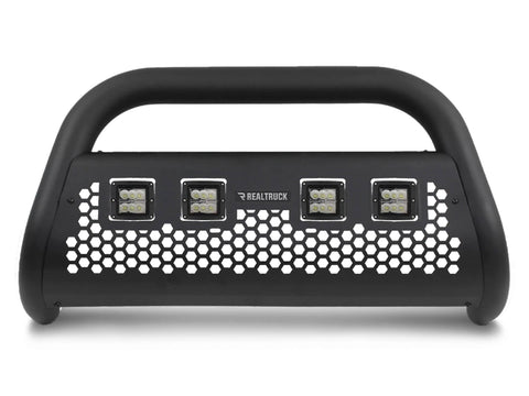 Textured black bull bar with four square LED cube lights in a hex-perforated plate, front view on white