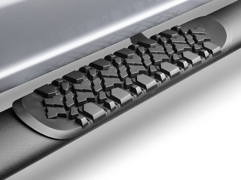 Close-up of the tire-tread step pad on a black tubular side step