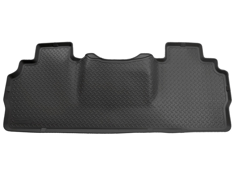 Husky Liners Classic Style: black one-piece second-row floor liner on a white background