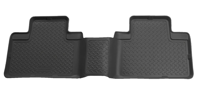 Husky Liners Classic Style: black one-piece second-row floor liner on a white background (representative image; each liner is molded for its own vehicle)