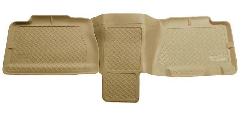 Husky Liners Classic Style: tan one-piece second-row floor liner with a center hump extension on a white background