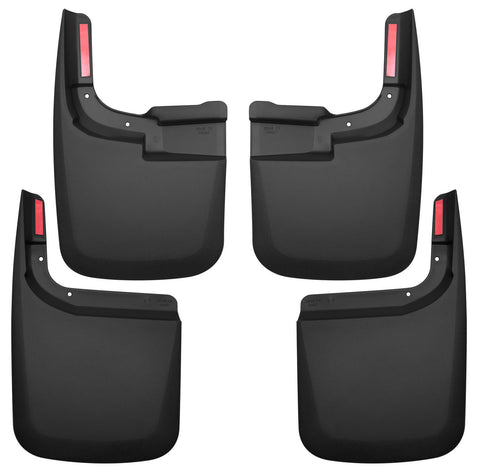 Husky Liners Custom Molded: set of four black molded mud guards with red reflectors, front and rear pairs, on a white background