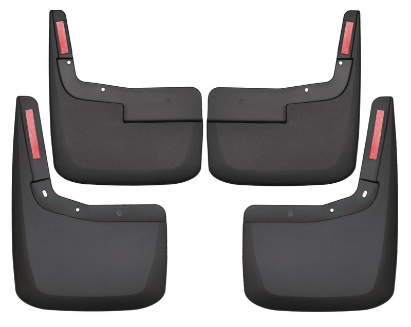Husky Liners Custom Molded: set of four black molded mud guards with red reflectors, front and rear pairs, on a white background