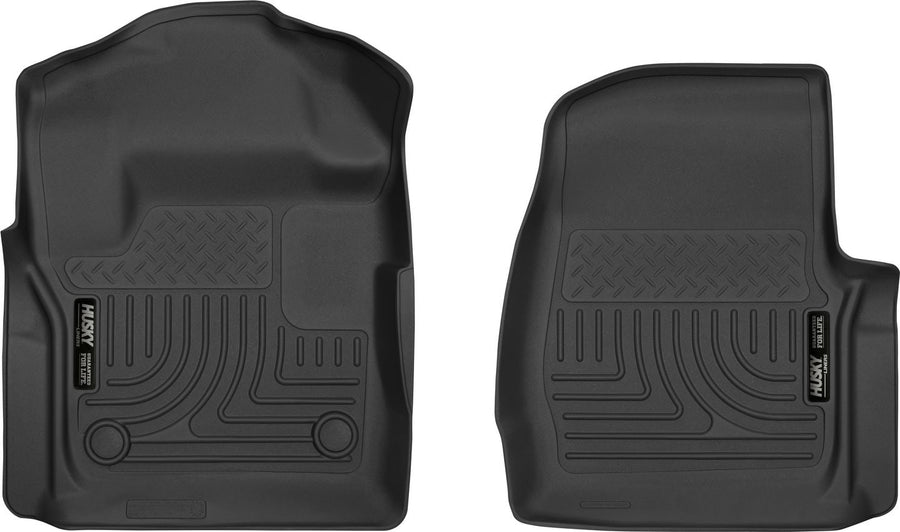 Husky Liners X-act Contour Floor Liners: Two black front floor liners on white, driver side with two retention holes