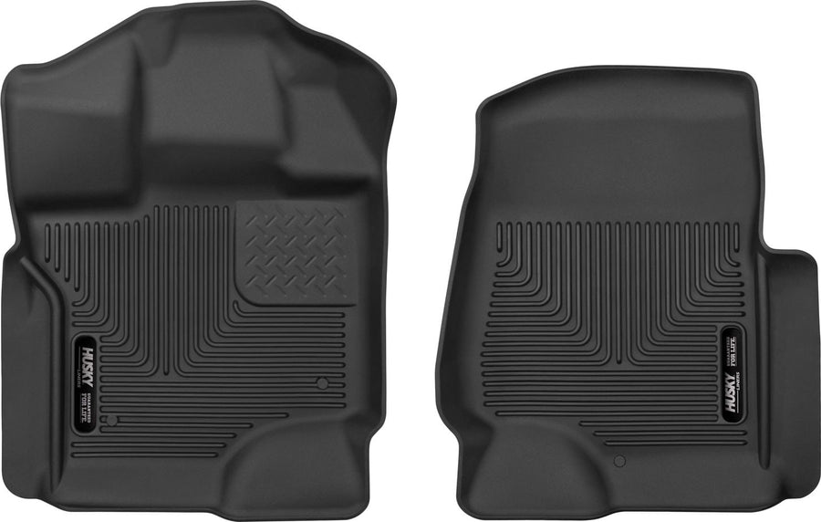 Husky Liners X-act Contour Floor Liners: Black molded front floor liner pair with Husky Liners logo plates on a white background
