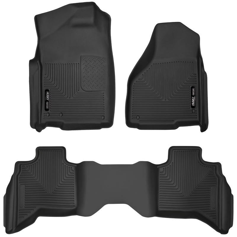 Husky Liners X-act Contour: black molded front floor liner pair with matching rear floor liner with Husky Liners logo plates on a white background