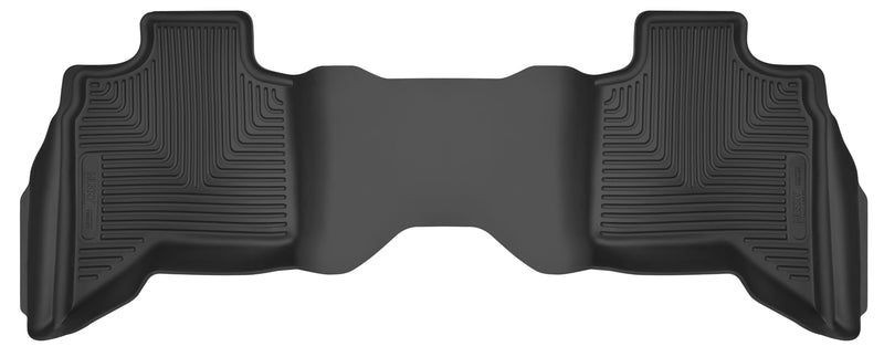 Husky Liners X-act Contour: black molded one-piece rear floor liner with Husky Liners logo plates on a white background