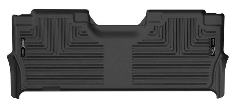 Husky Liners X-act Contour: black molded one-piece rear floor liner with Husky Liners logo plates on a white background