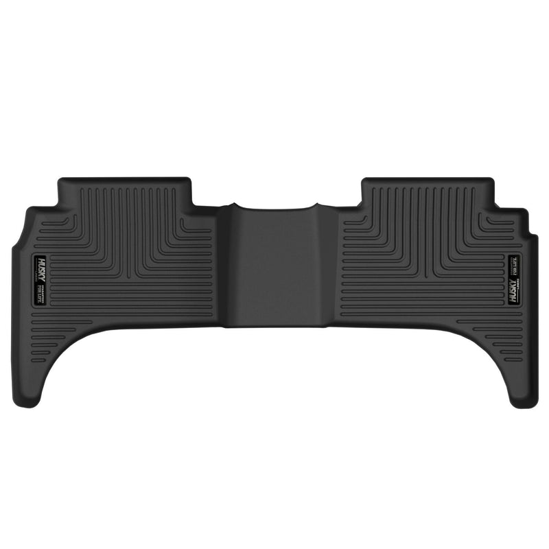 Husky Liners X-act Contour: black one-piece rear floor liner on white, with a raised center section