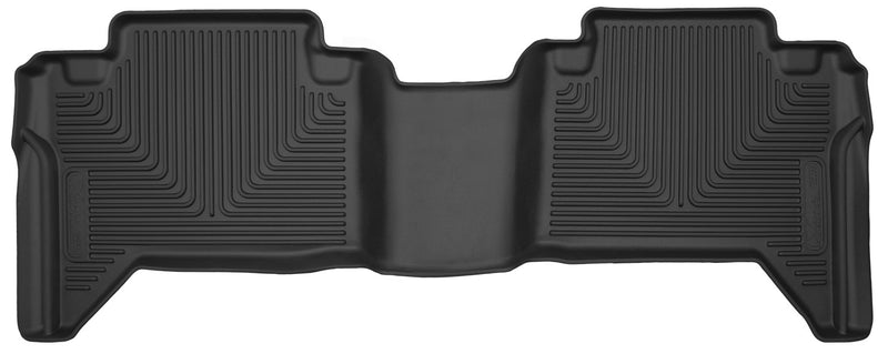 Husky Liners X-act Contour: black X-act Contour one-piece second-row floor liner on a white background