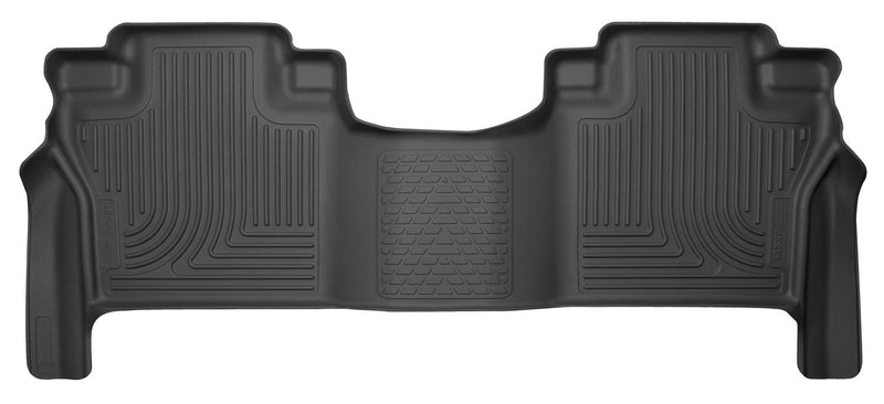 Husky Liners X-act Contour: black X-act Contour one-piece second-row floor liner on a white background