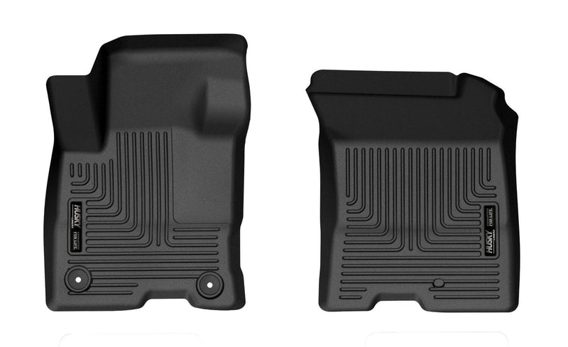 Husky Liners X-act Contour: two black front floor liners on white, driver side with two retention holes